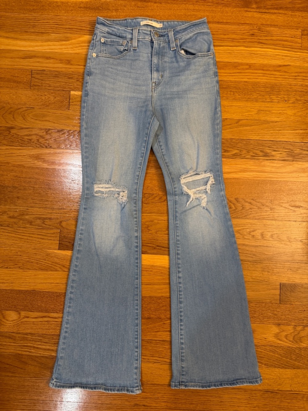 Levi's 726 High Rise Flare Jeans in Light Wash Blue Denim - Size 27 Distressed